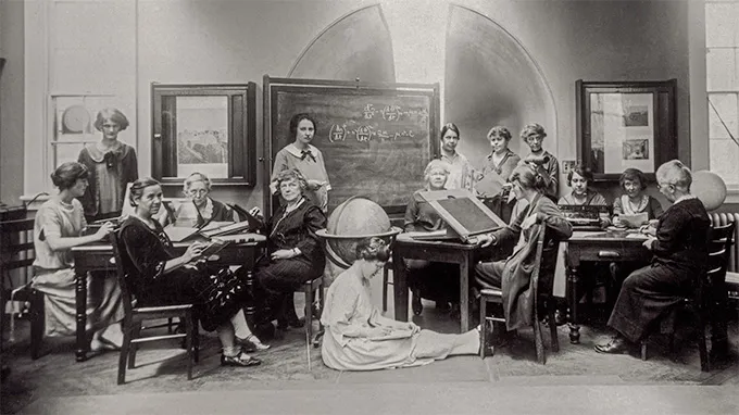 1925, women at Harvard University as “astronomical computers,” studying glass photographic plates with images of stars. Cecelia Payne-Gaposhkin sits at the drafting table.