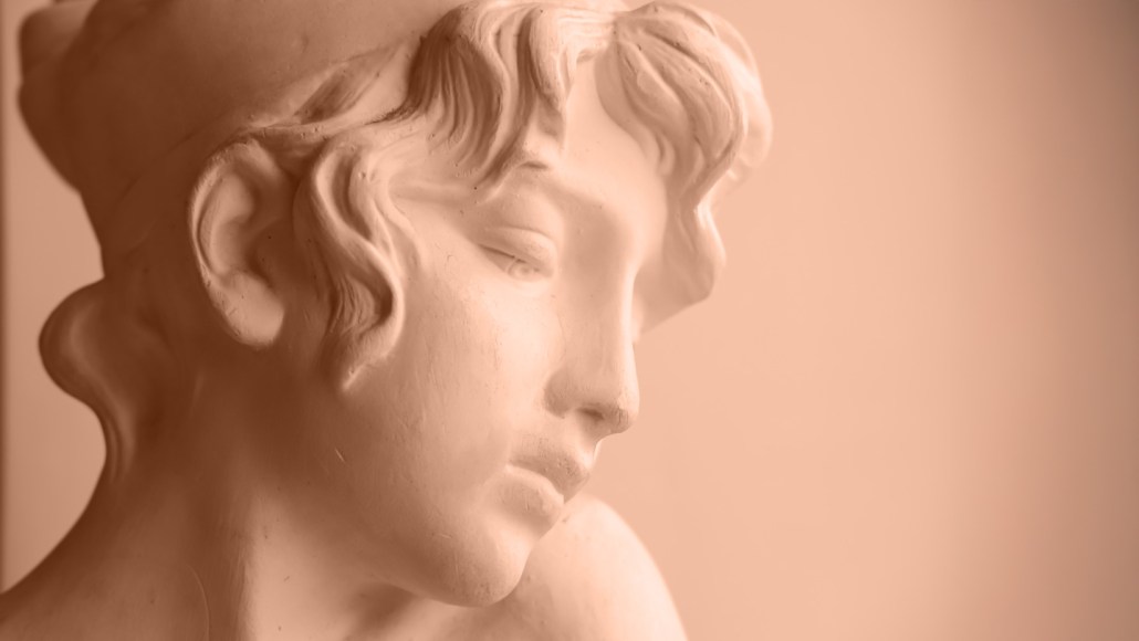 A tan, clay-like figure of a person.