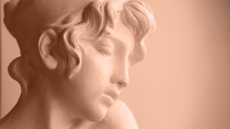 A tan, clay-like figure of a person.