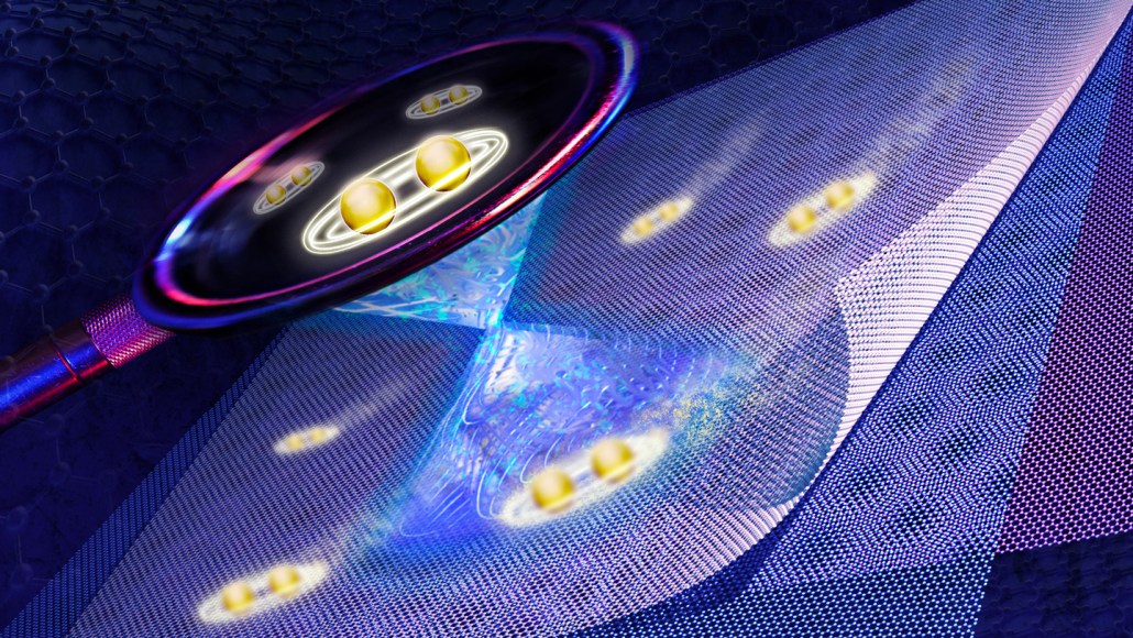 An illustration shows a magnifying glass inspecting a materal made of three layers. Inside are pairs of electrons.