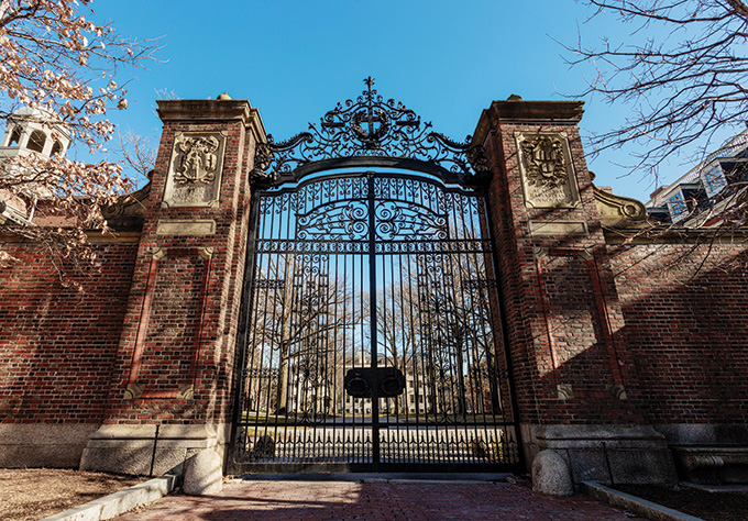Image of Harvard's Johnston Gate. The gate is closed in this image.