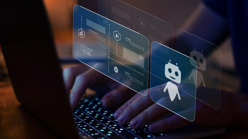 A close-up photo of hands hovering over a laptop's keyboard has an overly demonstrating the use of AI, which can alter voters' perceptions of political candidates.