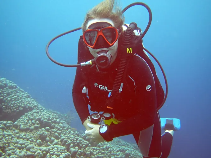 A picture of Nicola Dell, underwater, in scuba gear