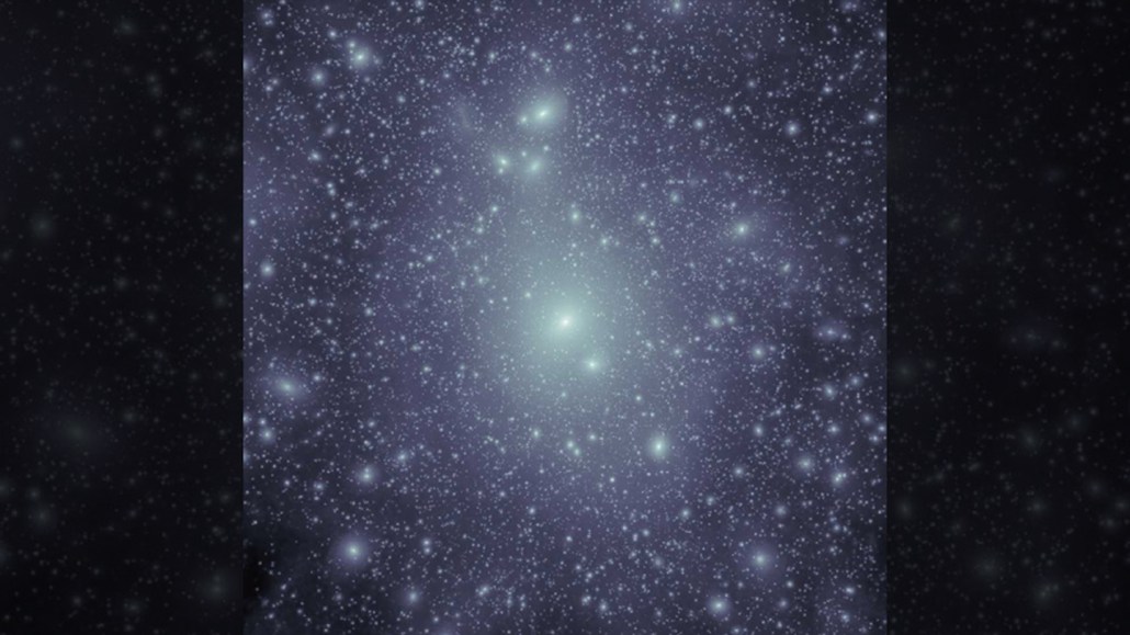 Bright spots on a dark background show dark matter's distribution in clumps.