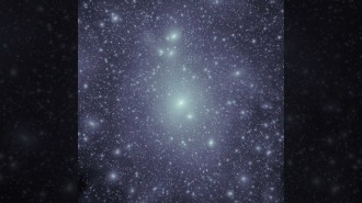 Bright spots on a dark background show dark matter's distribution in clumps.