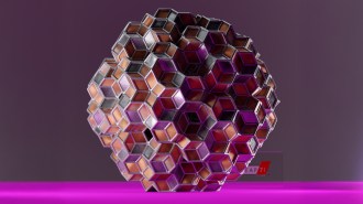 A 3-D object made of smaller shapes illustrates a structure that has order but no repeating pattern.