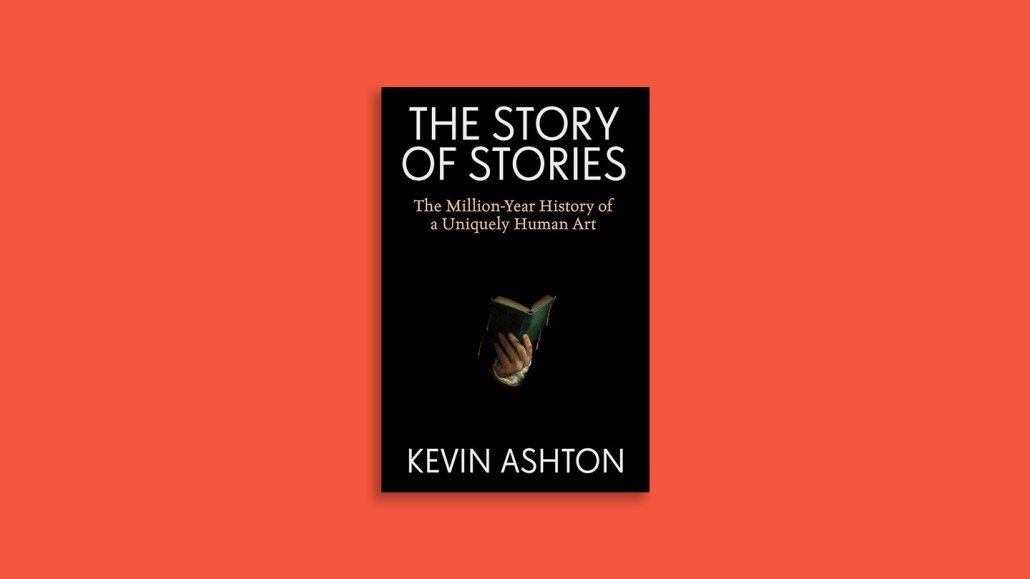 Book cover for "The Story of Stories" byt Kevin Ashton. Black background with the hand holding a book.