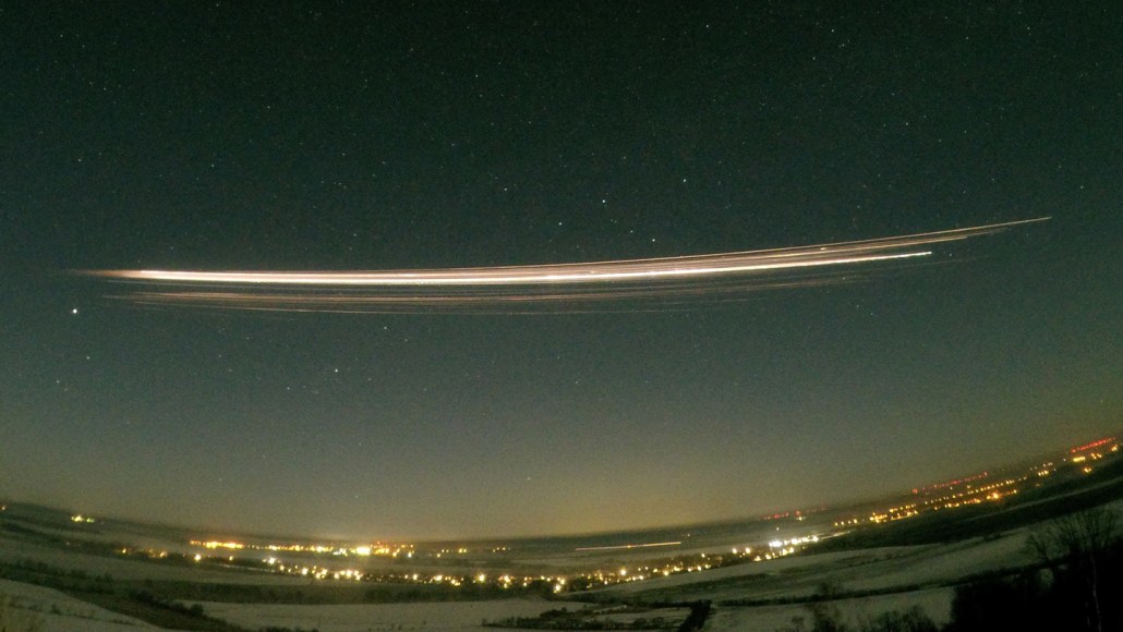 A Falcon 9 upper stage rocket disintegrates into fragments on February 19, 2025.