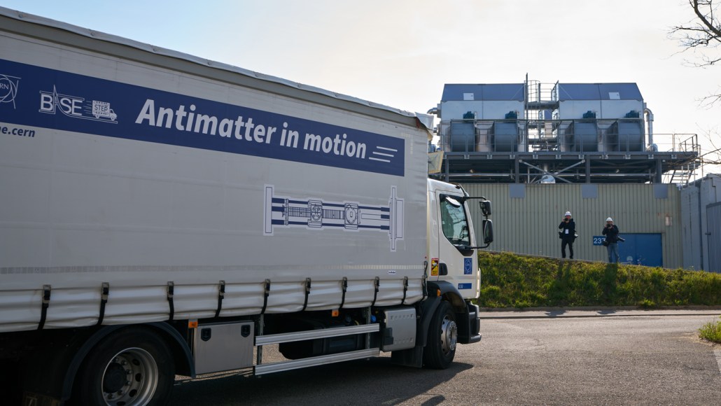 A truck with a banner reading "Antimatter in motion."