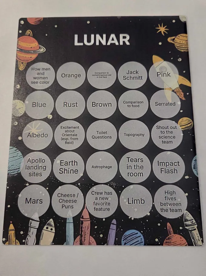 A bingo card has spots for Apollo landing sites, Earth Shine and Tears in the Room.