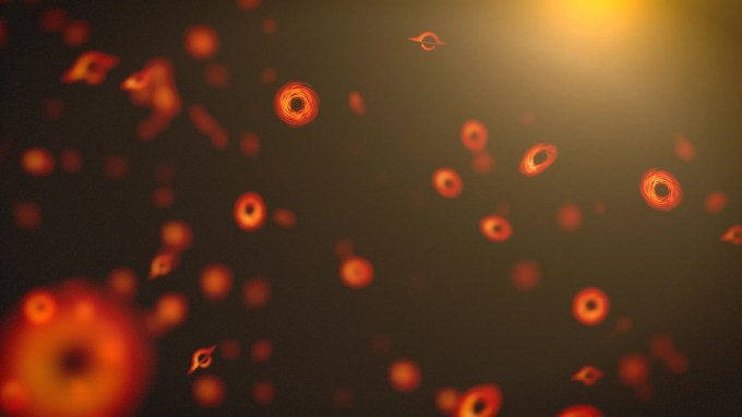 Many orange rings represent primordial black holes in an illustration