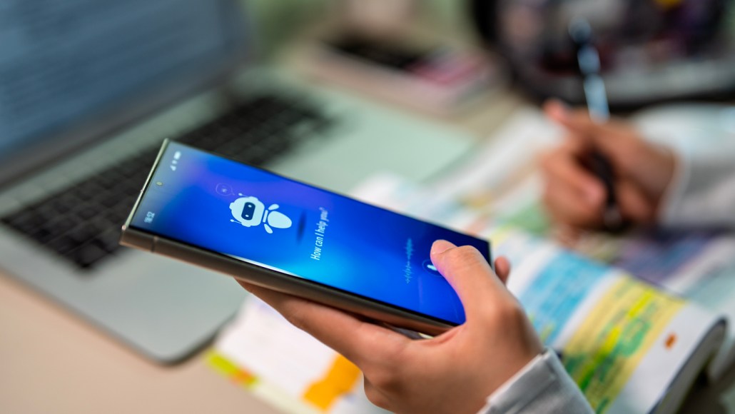 A person opening an AI chatbot on their phone.