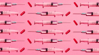 Partially filled syringes and red pill capsules are laid in a pattern on a pink background, in a way to illustrate how peptides may be administered.