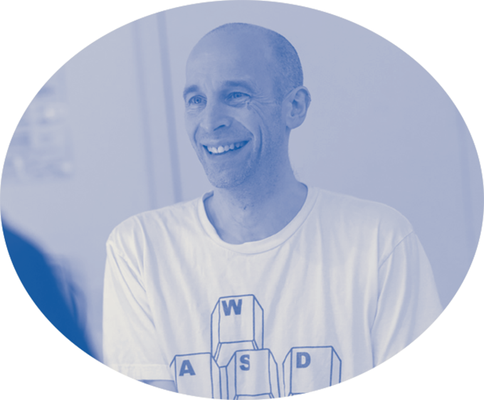 An image of a man, shaded in blue.