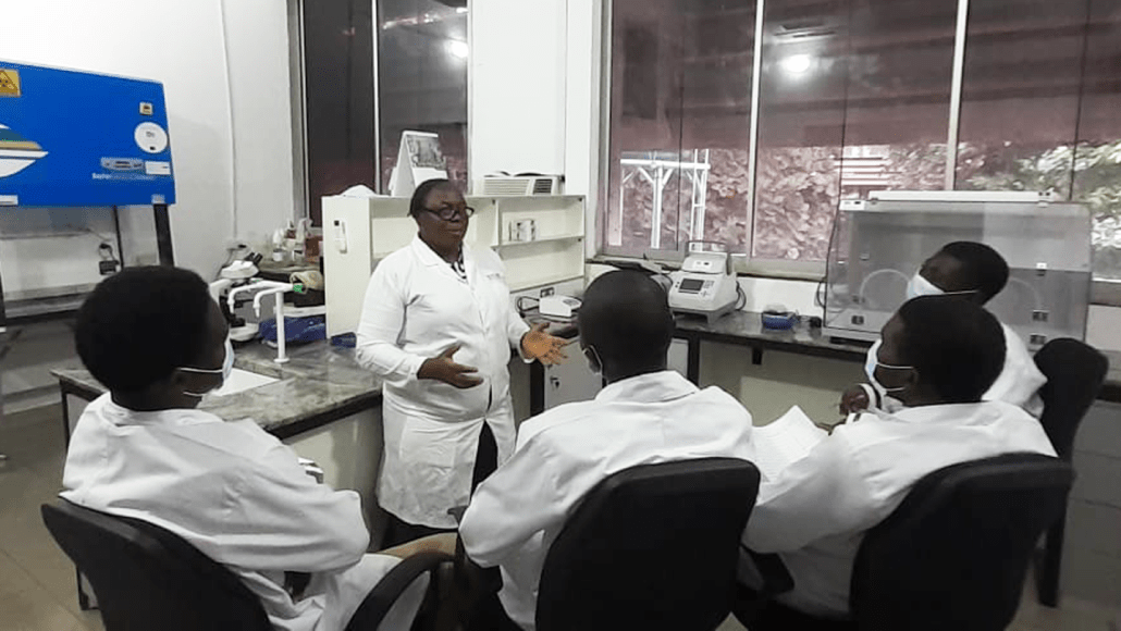 Margaret Oluwatoyin Japhet talks to her lab members