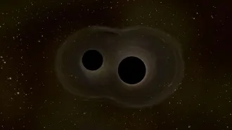 An illustration shows two black holes relatively close to each other against a starry space background.