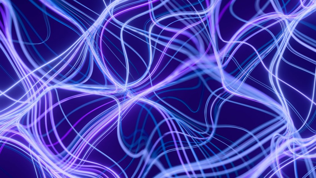 Wiggly purple lines overlapping one another on a dark background