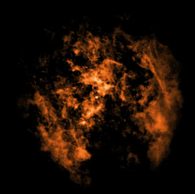 Orange billows of gas form a circle except at the bottom where there is a cone-shaped void, evidence of wind blowing from the Milky Way's central black hole, researchers say.