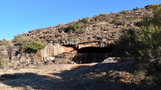 A fenced-off cave entrance