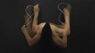 A composite image of arms shows a person writing the number eight with the left hand and the right hand. The eight on the right is smoother.