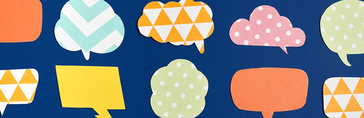 Comic speech balloons with different patterns represent the tens of thousands of languages spoken a few thousand years ago.