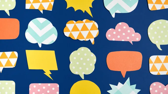 Comic speech balloons with different patterns represent the tens of thousands of languages spoken a few thousand years ago.