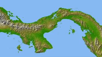 An topographical map shows the green-and-brown Isthmus of Panama against a blue backdrop.