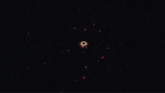 An illustration of stars orbiting the Milky Way's central, supermassive black hole